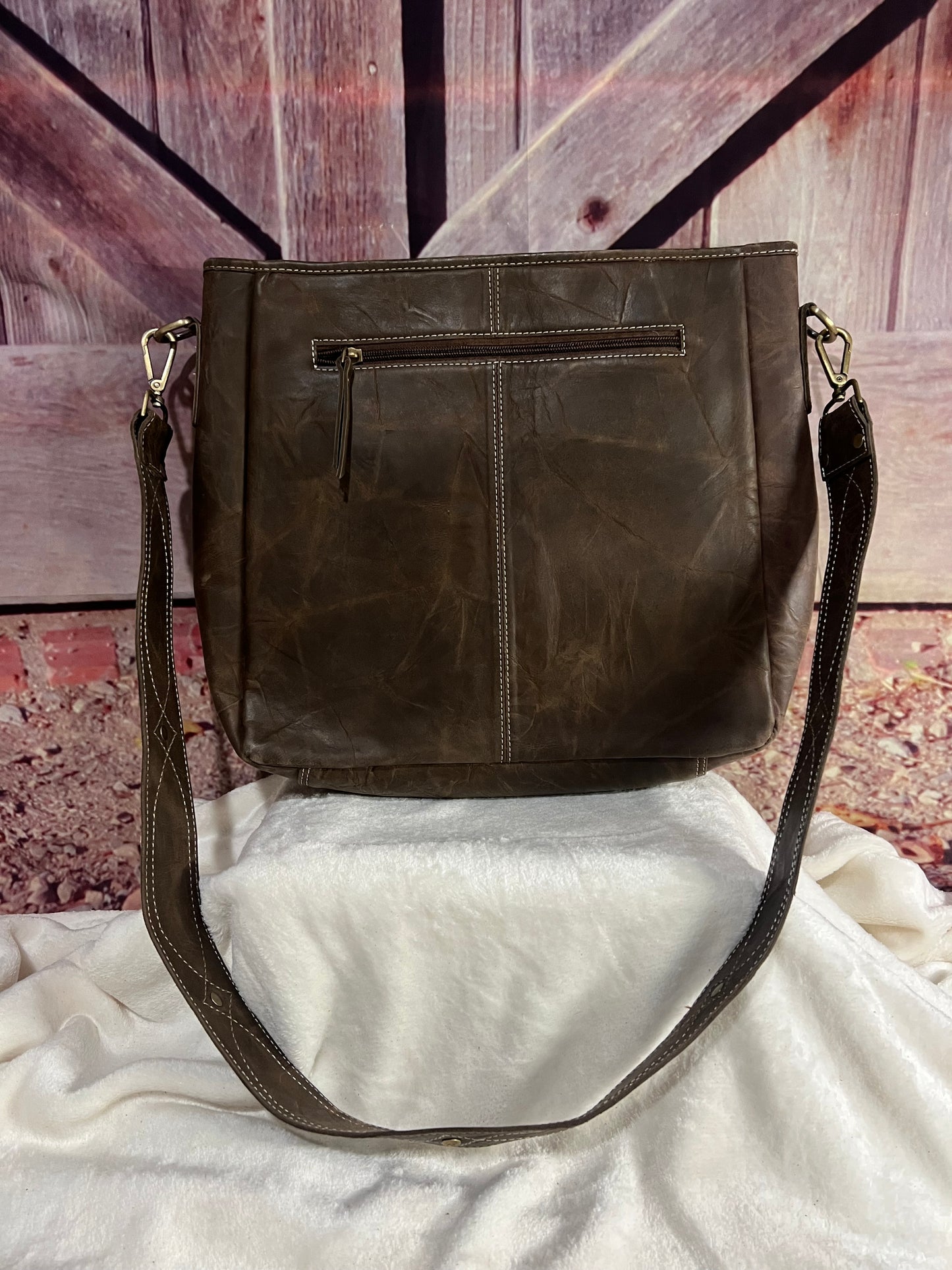 Cowhide and leather purse
