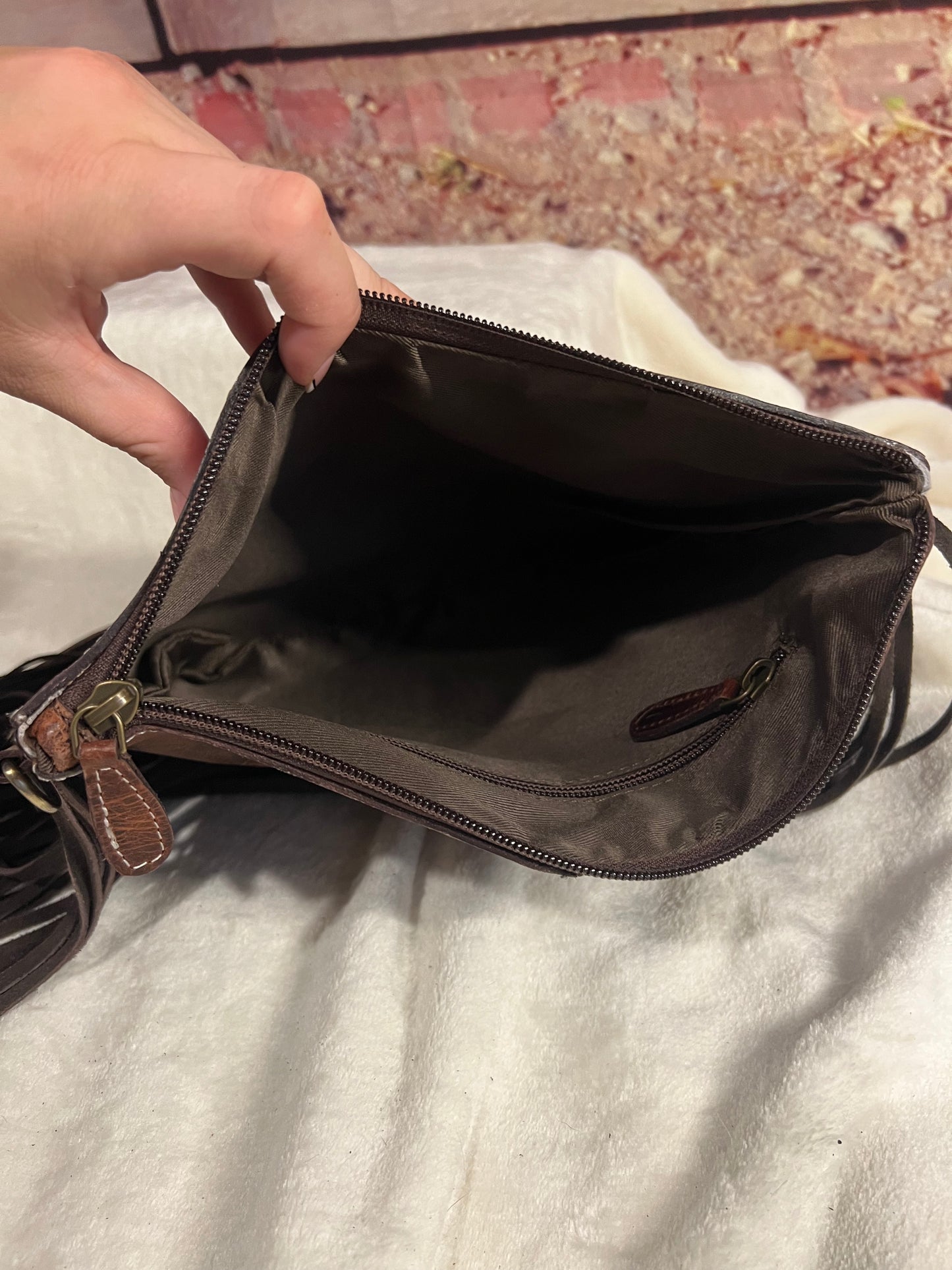 Hide and leather crossbody