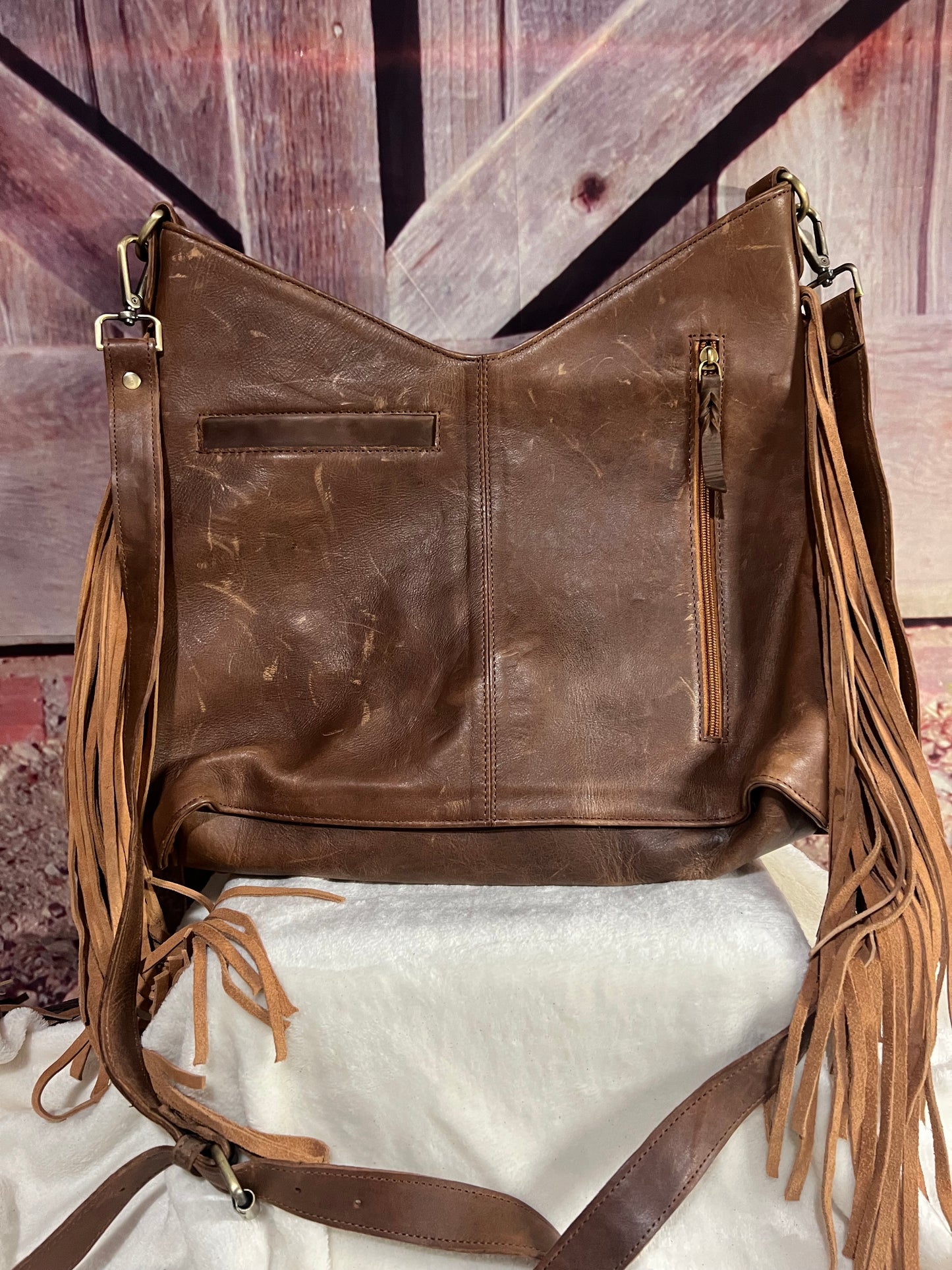 Hide and leather purse
