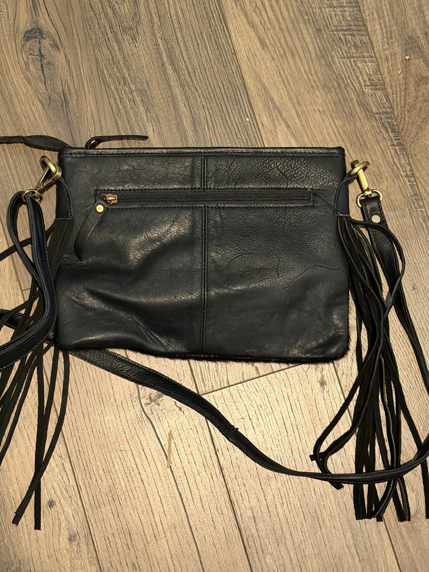 Crossbody hide / leather