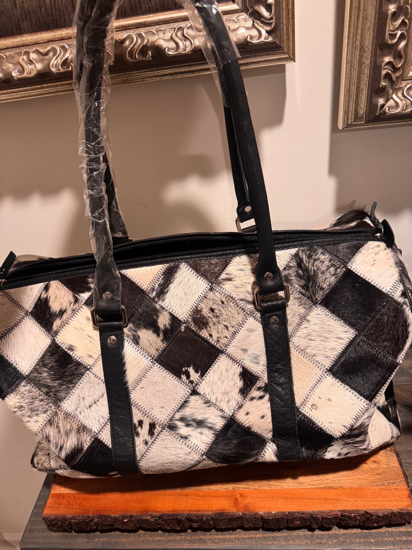 Patch work cowhide duffle bag