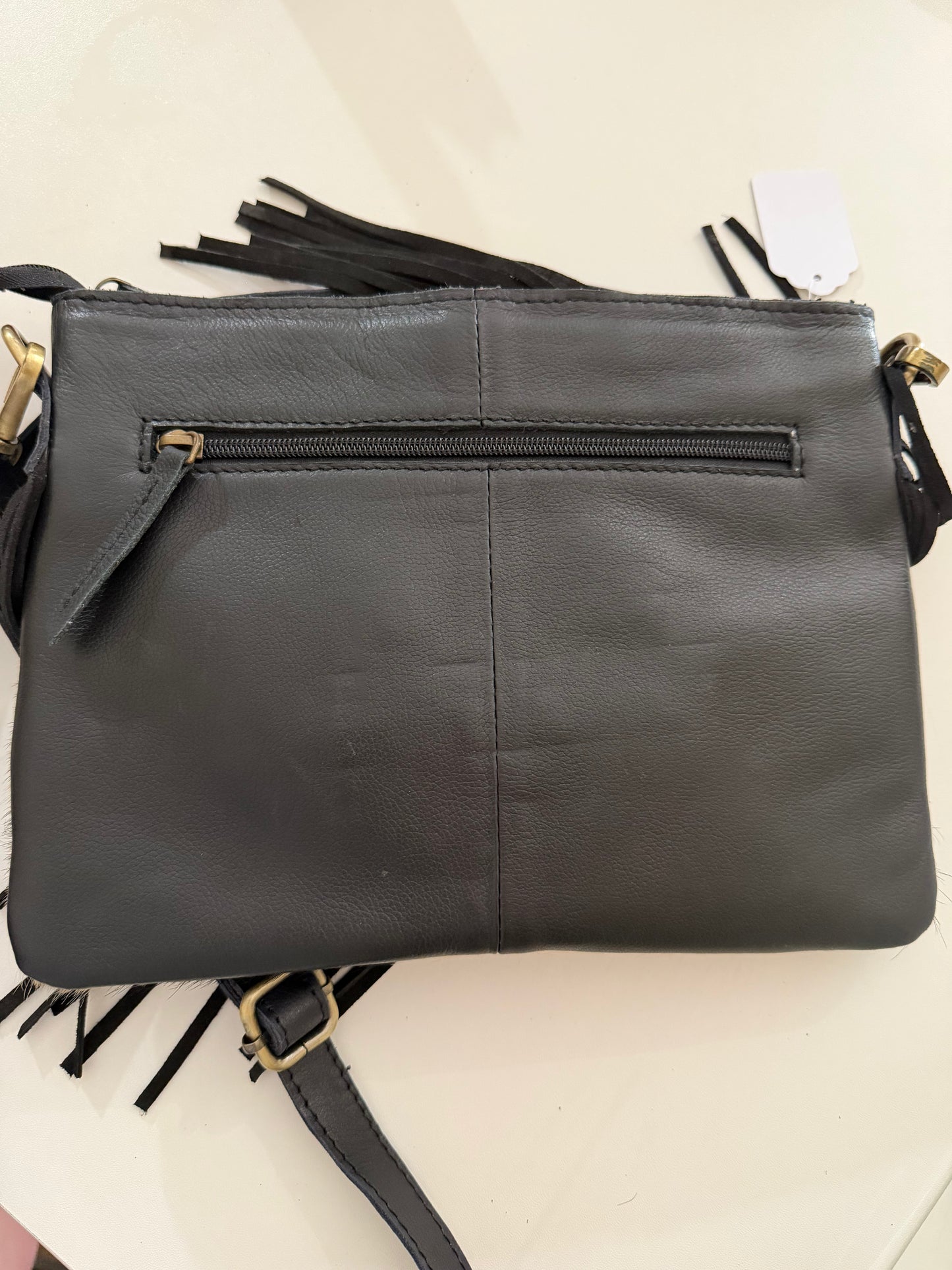 Crossbody leather/ hide feather