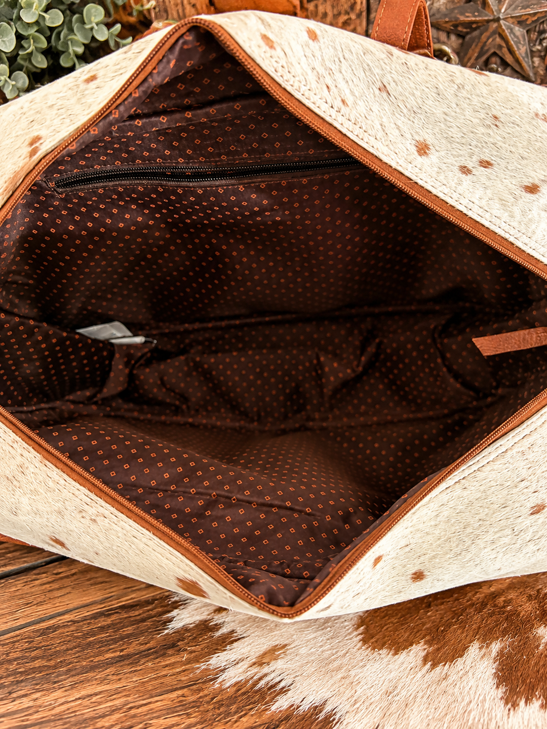 Cowhide duffle bags