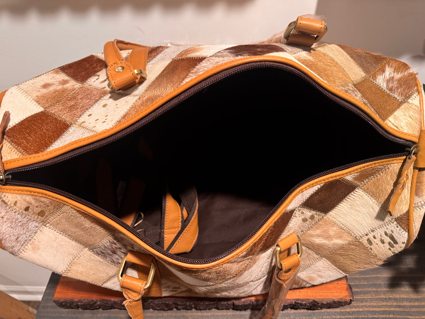 Patch work cowhide duffle bag