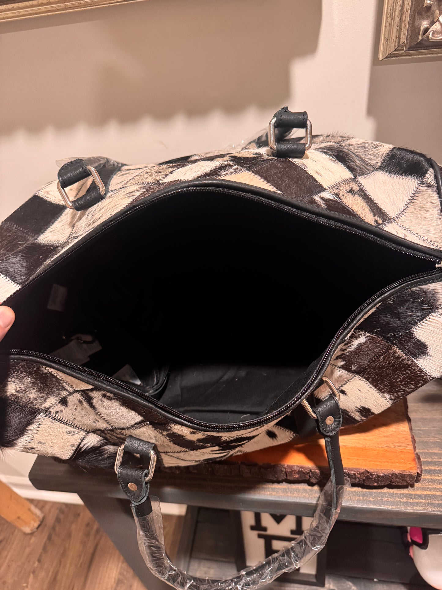 Patch work cowhide duffle