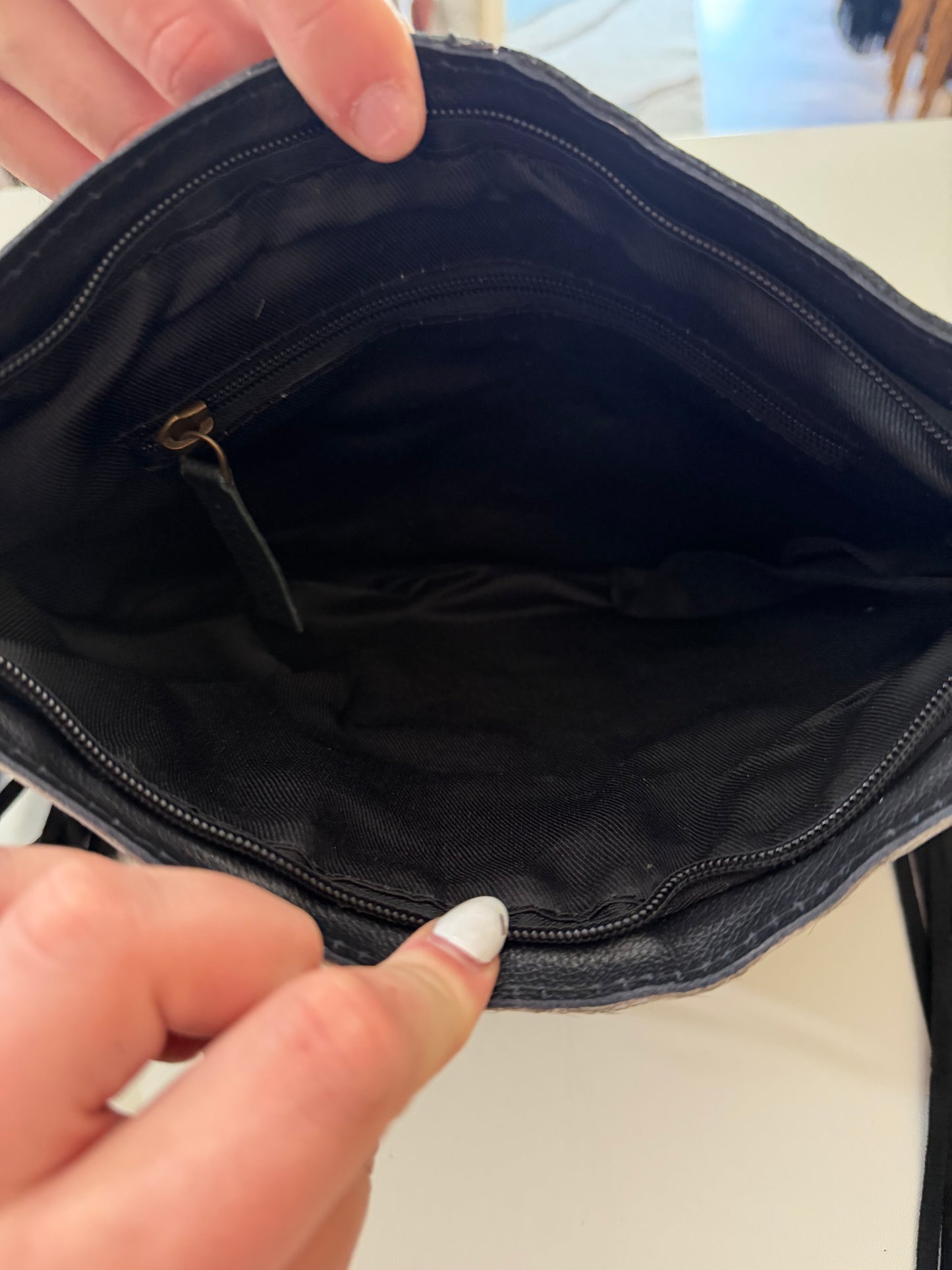 Crossbody leather/ hide feather